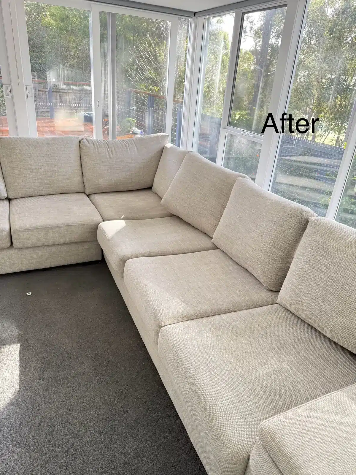 After: cream L-shaped modular lounge cleaned in a sunroom