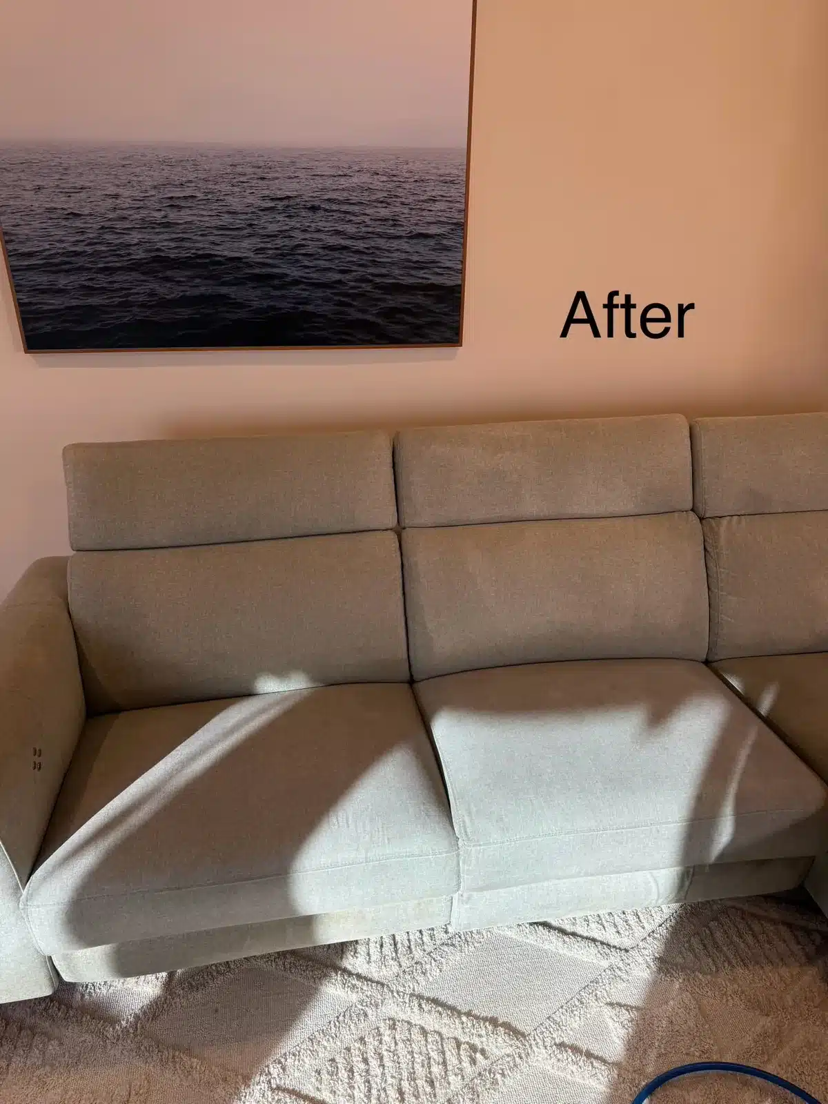 After: cream three-seater sofa cleaned