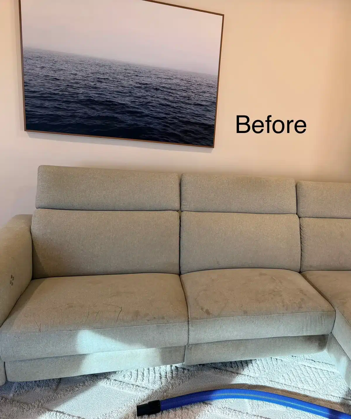 Before: cream three-seater sofa cleaned