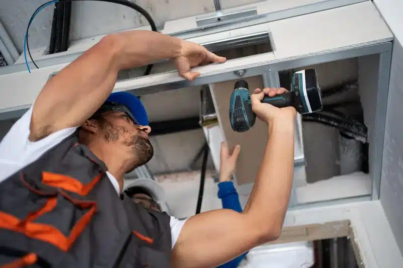 Ducted heating vent being cleaned