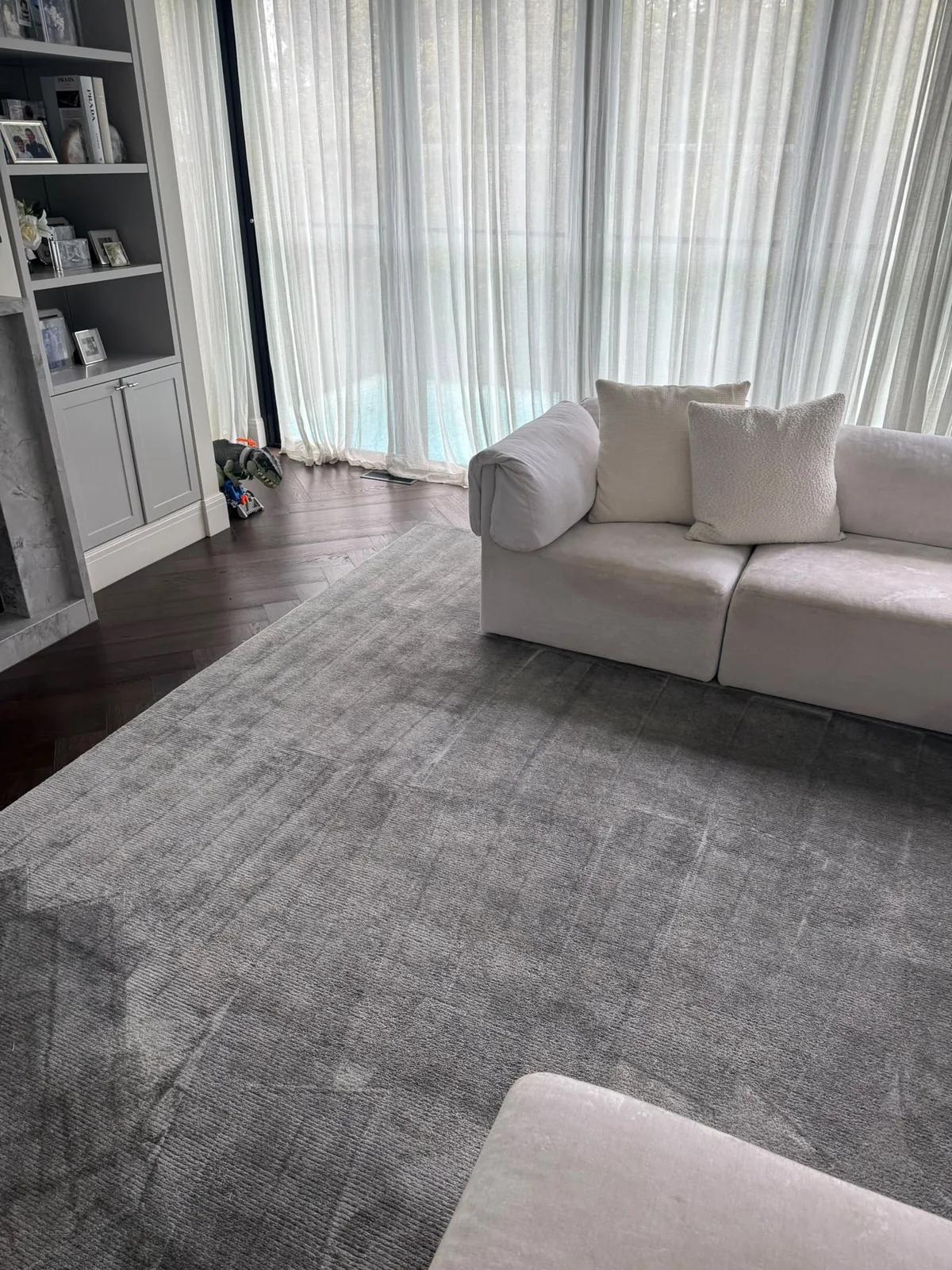 freshly steam cleaned grey carpet in a Melbourne living room
