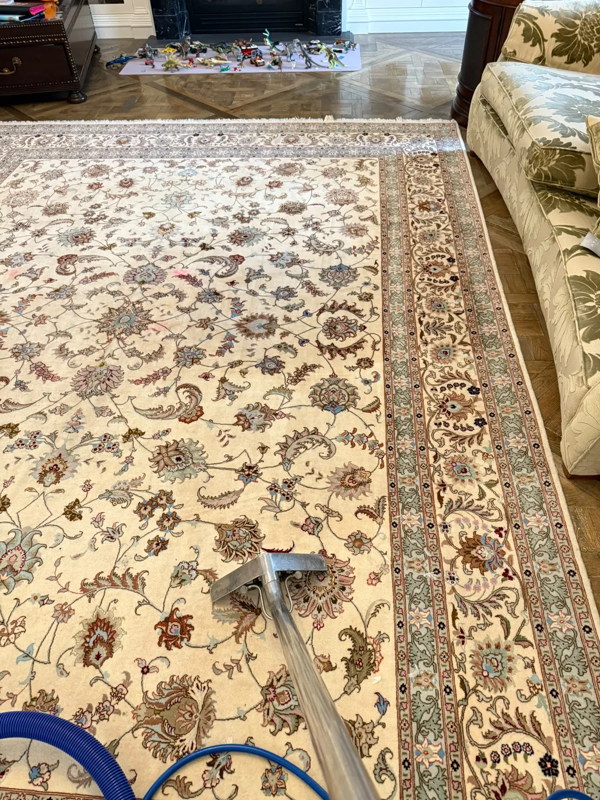 After: ornate wool Persian rug with a large stain, cleaned on site